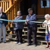 Ribbon cutting ceremony at Round Lake Hall.  Mabel Forsyth, daughter of Round Lake Tommy.